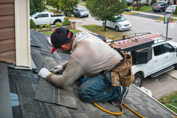 Professional Roofing technician working in Highland Park, IL